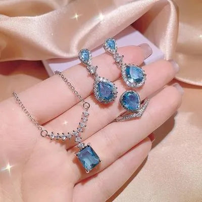 Women’s Blue Crystal Silver Plated Jewellery Set – Necklace, Ring & Earrings (4 Pcs)